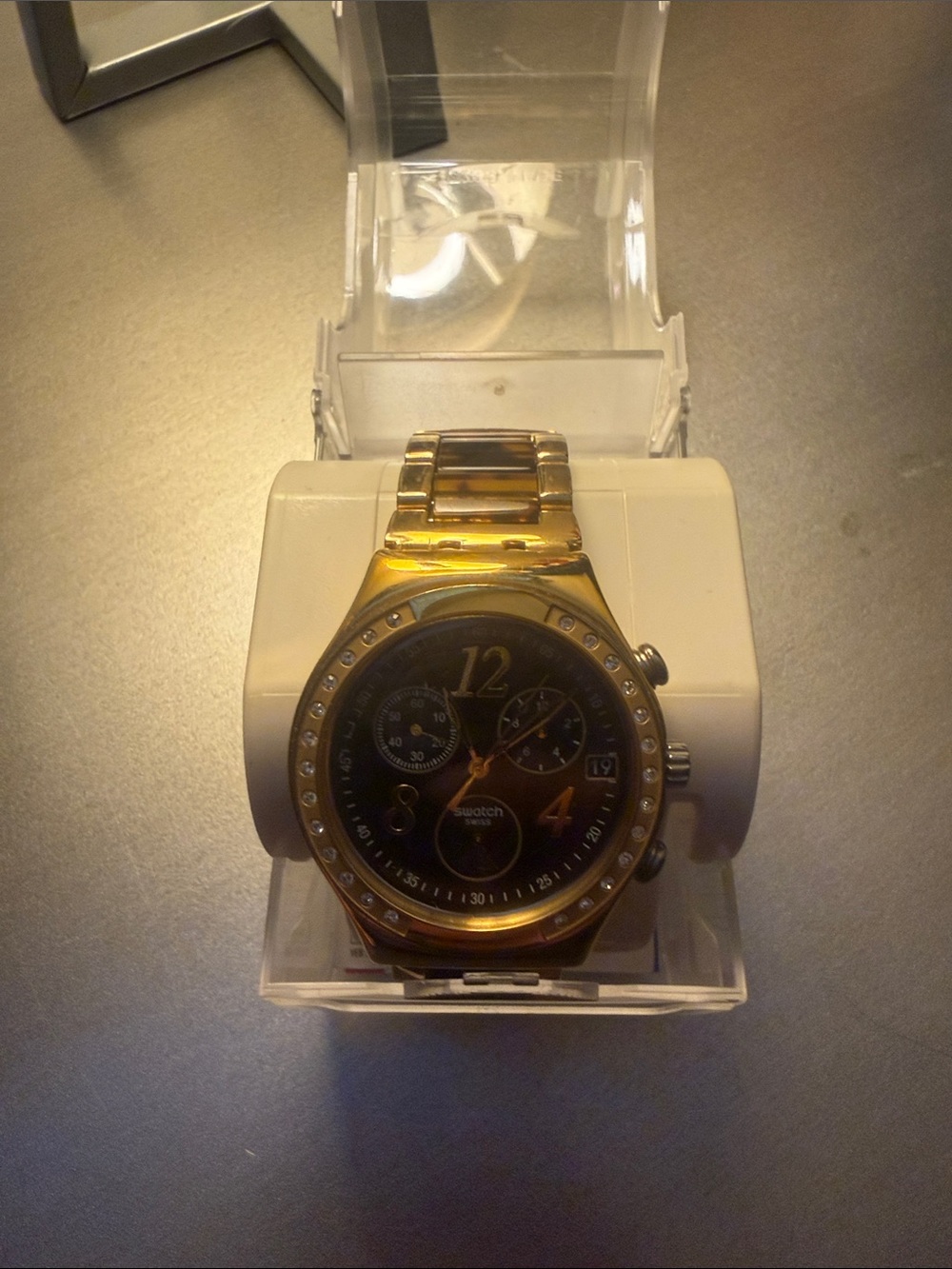 Swatch Gold and Black Chronograph Watch with Crystal Bezel